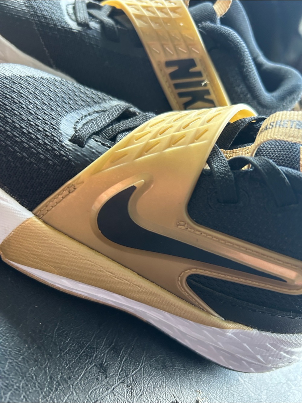 Nike Kids Black and Gold Sneakers
